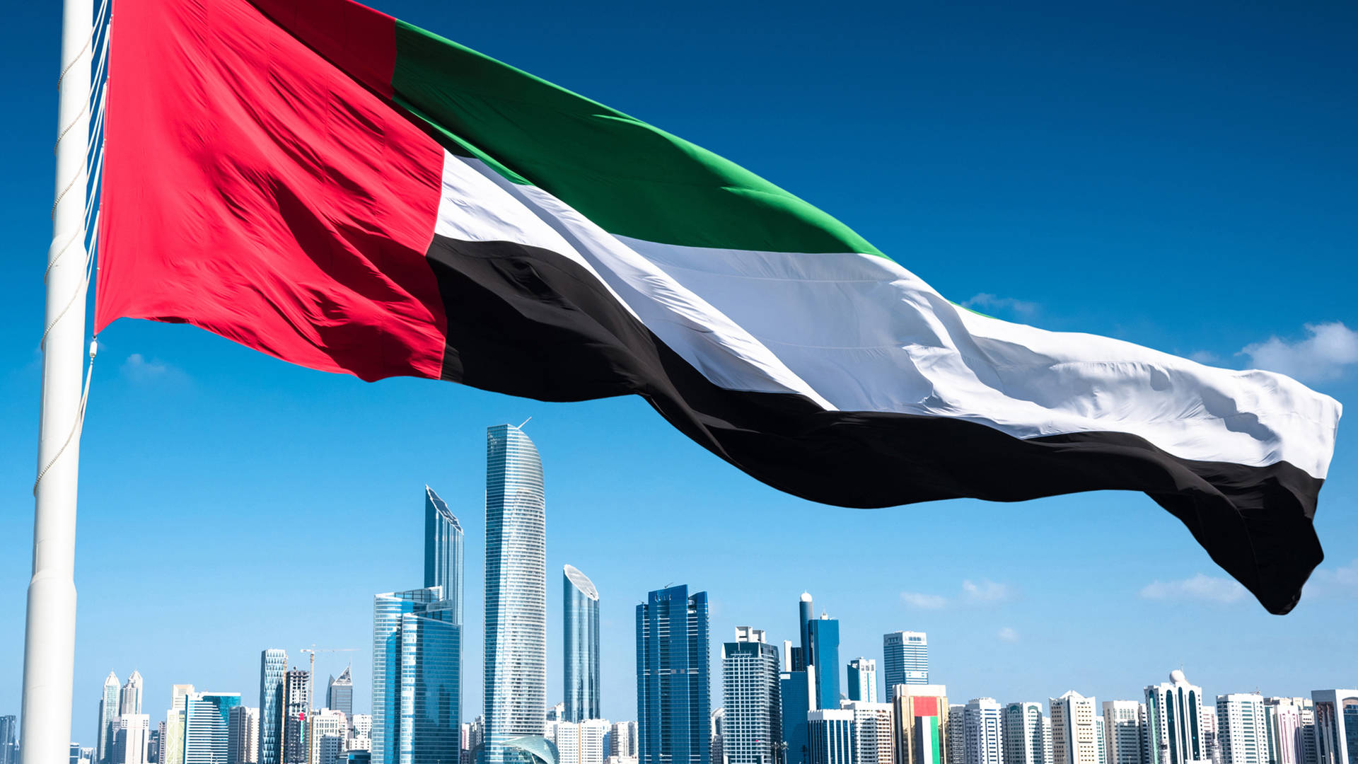 Объединенные арабские на английском. Флаг Объединённых арабских Эмиратов. Флаг ОАЭ В Абу-Даби. Эмират Абу-Даби флаг. United arab Emirates флаг.