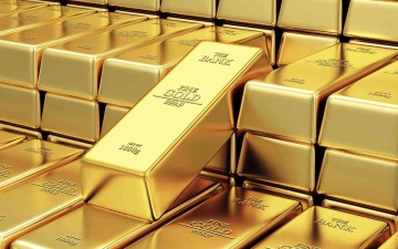 الصورة: الصورة: الذهب يتراجع مع صعود الدولار