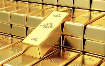 الصورة: الصورة: الذهب ينخفض وتراجع الدولار يحدّ من الخسائر