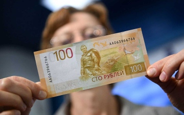 الصورة: الصورة: الروبل الروسي ينخفض أمام الدولار واليورو