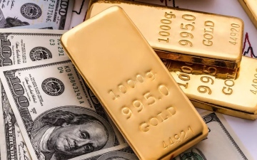 الصورة: الصورة: الذهب يرتفع مع انخفاض الدولار