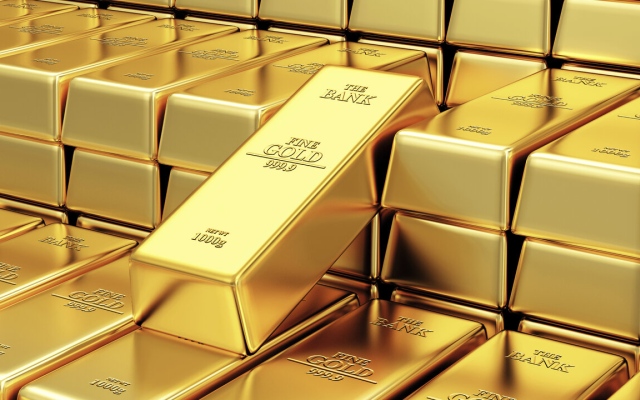 الصورة: الصورة: الذهب يتجه لتسجيل  مكاسب أسبوعية على خلفية ضعف الدولار  والتوترات الجيوسياسية