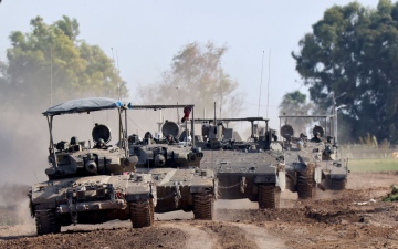 الصورة: الصورة: الجيش الإسرائيلي يبدأ عملية عسكرية مباغته في وسط غزة