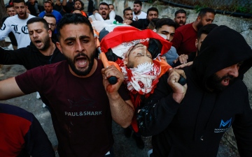 الصورة: الصورة: مقتل فلسطيني وإصابة 25 باشتباكات في الضفة الغربية