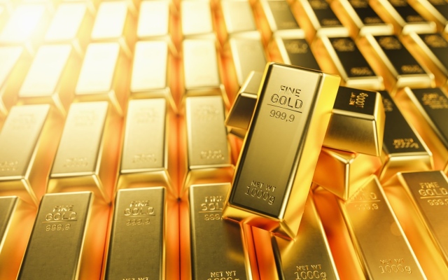 الصورة: الصورة: الذهب يتراجع مع صعود الدولار وترقب اجتماع الاحتياطي الاتحادي