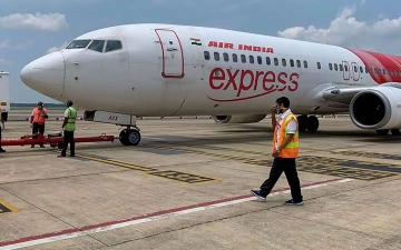 الصورة: الصورة: إير انديا إكسبريس للطيران تلغي عدة رحلات بعد إبلاغ عدد من العاملين عن إصابتهم بـ «مرض»