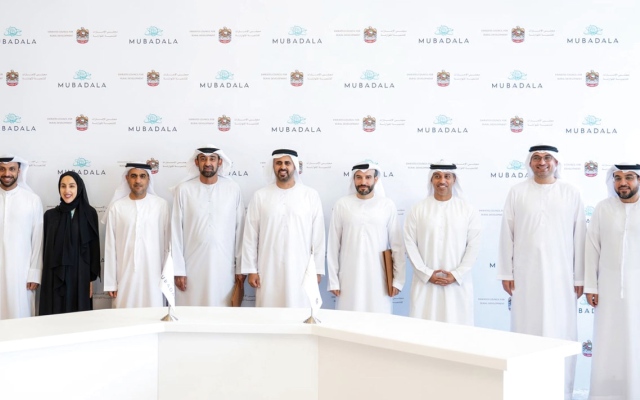 الصورة: الصورة: ذياب بن محمد يشهد توقيع اتفاقية بين «الإمارات للتنمية» و«مبادلة»
